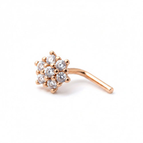 Rose gold nose ring with clear gemstones on a white background
